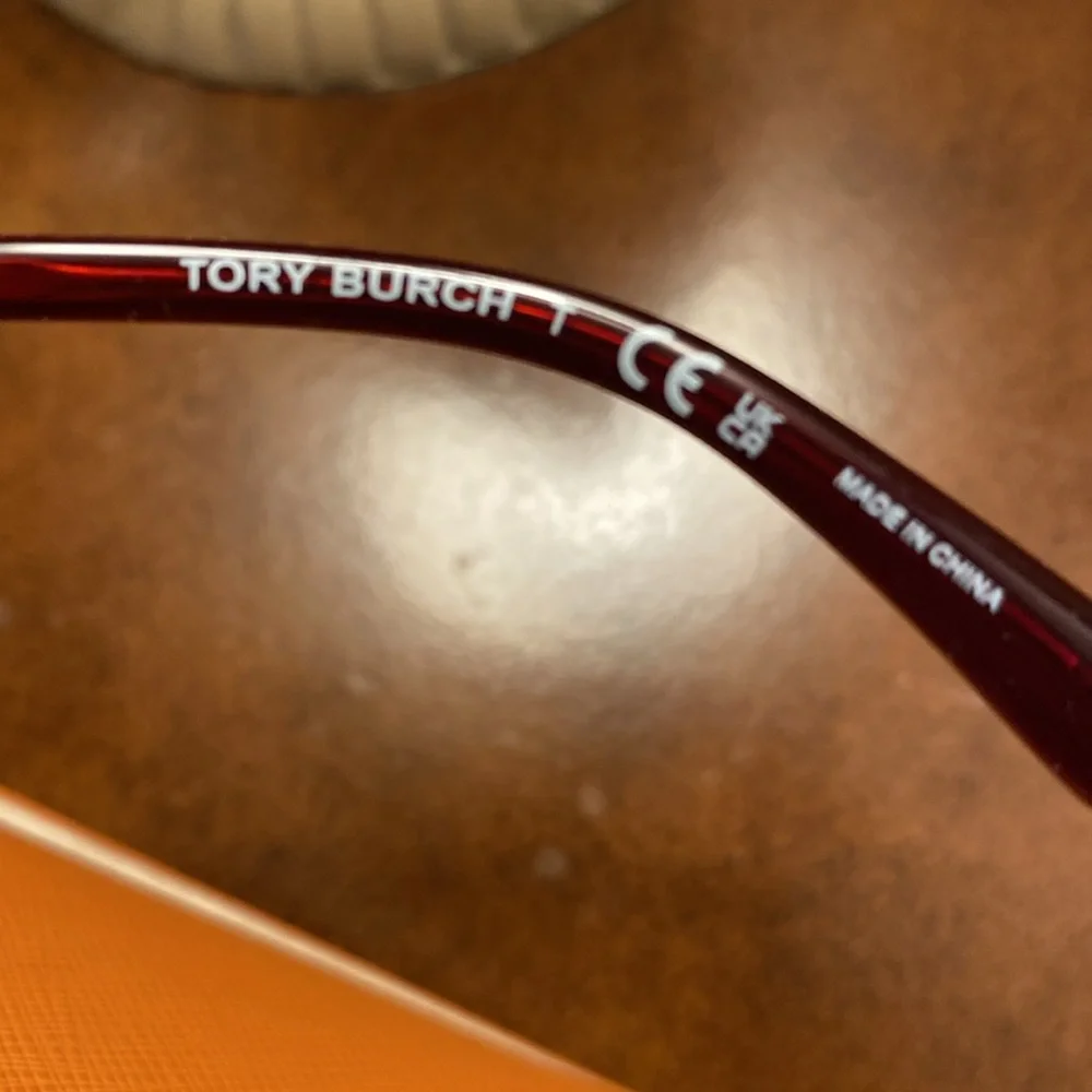 Tory Burch “Cranberry” sunglasses - New with case and dust bag.